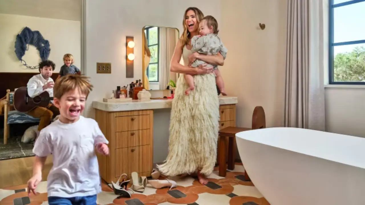 Mandy Moore Thought Her LA Dream Home Was Gone Forever — Here’s How She and Taylor Goldsmith Brought It Back to Life 1 Mandy Moore, Taylor Goldsmith and their three children at home in the primary bedroom and bathroom.